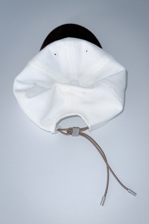 Enavant CORDUROY STRING BALL CAP in the color Ivory/Brown