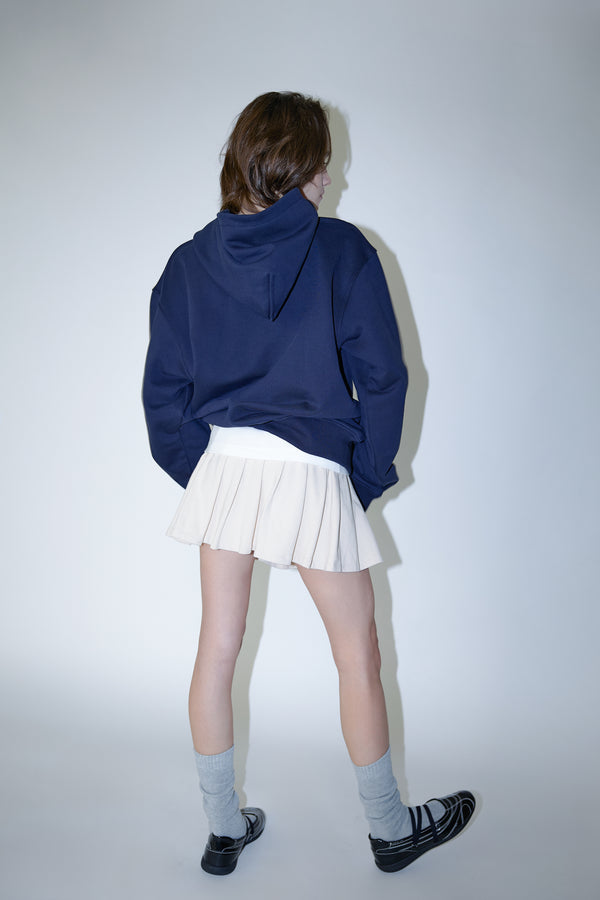 Enavant DYLAN PLEATED SKIRT in the color Coconut Beige