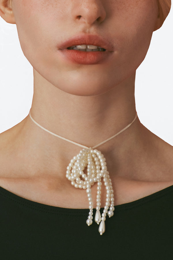 Enavant Flower bead motif accessory in the color Ivory03