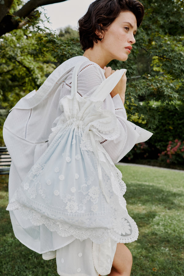 Enavant Lace-patched shoulder bag in the color White