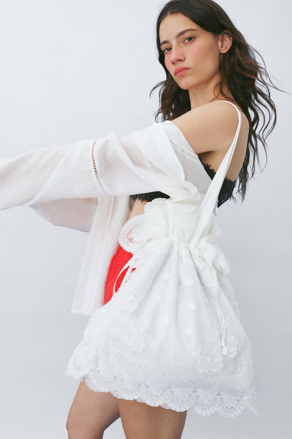 Enavant Lace-patched shoulder bag in the color White