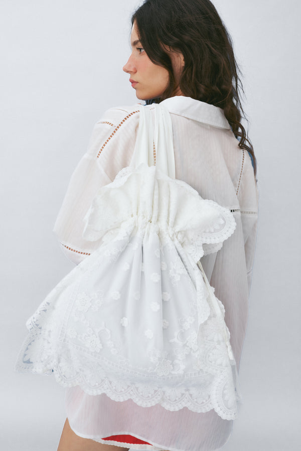 Enavant Lace-patched shoulder bag in the color White