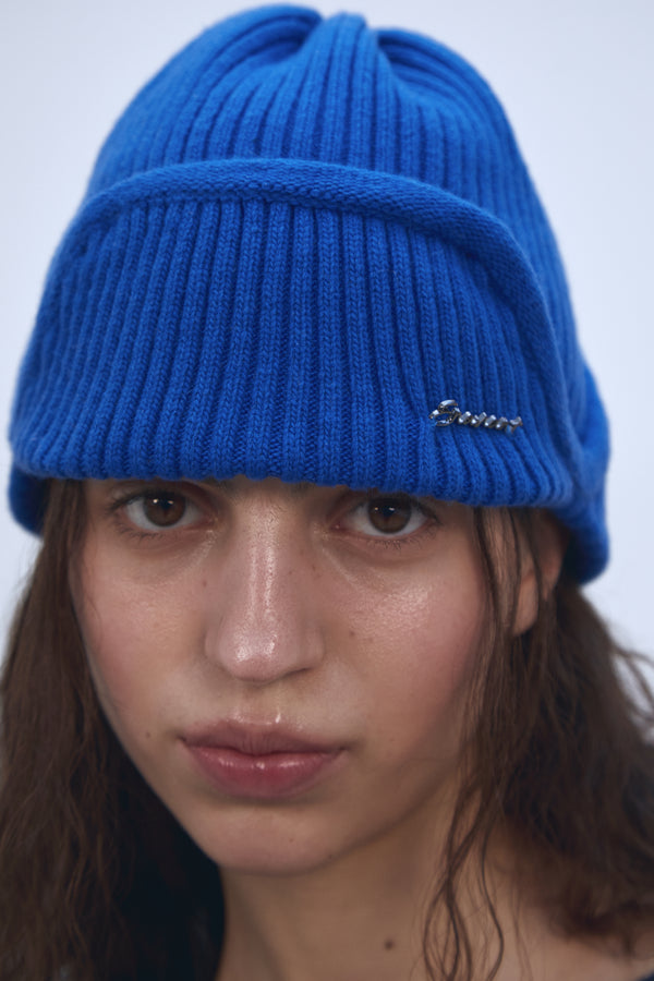 Enavant MERINO WOOL EARFLAP KNIT BEANIE in the color Blue