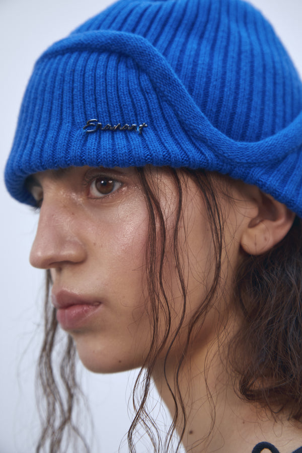 Enavant MERINO WOOL EARFLAP KNIT BEANIE in the color Blue