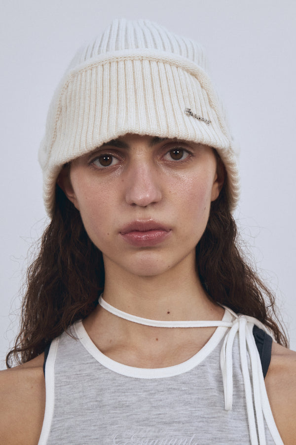 Enavant MERINO WOOL EARFLAP KNIT BEANIE in the color Ivory