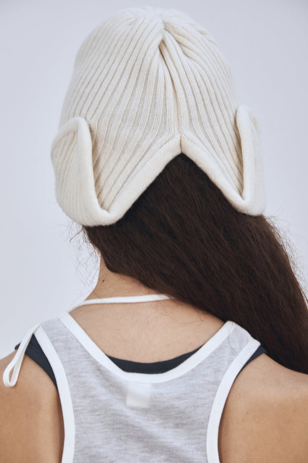 Enavant MERINO WOOL EARFLAP KNIT BEANIE in the color Ivory