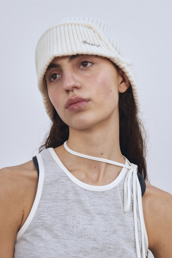 Enavant MERINO WOOL EARFLAP KNIT BEANIE in the color Ivory