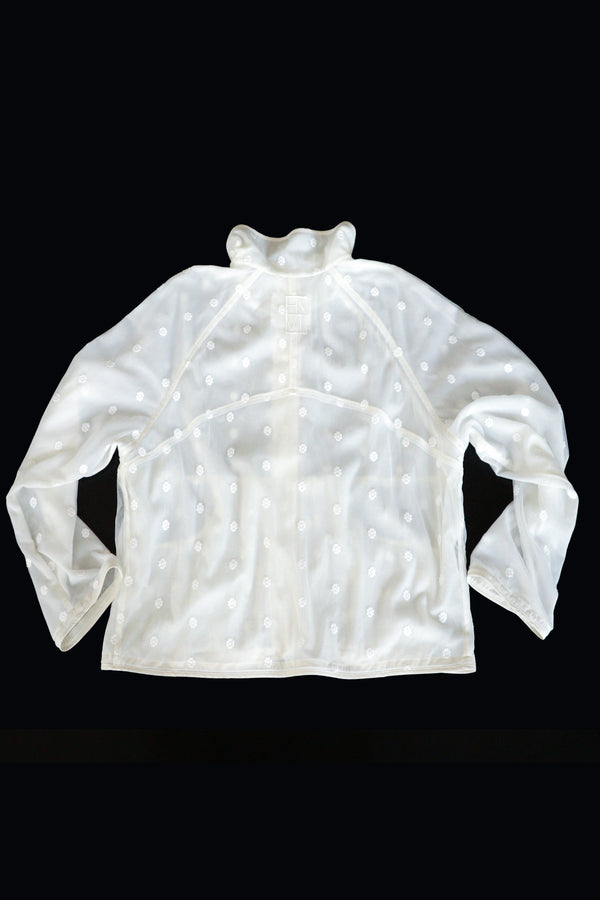 Enavant Sheer lace layered button-up windbreaker in the color Ivory