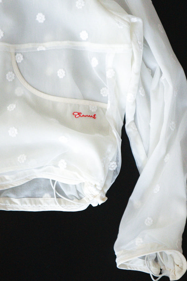Enavant Sheer lace layered button-up windbreaker in the color Ivory
