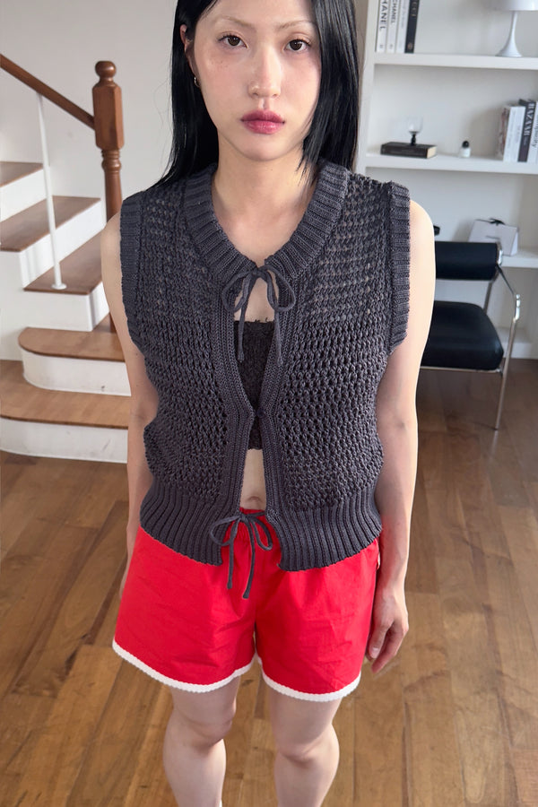 Enavant Knit button-up vest in the color Vintage Charcoal