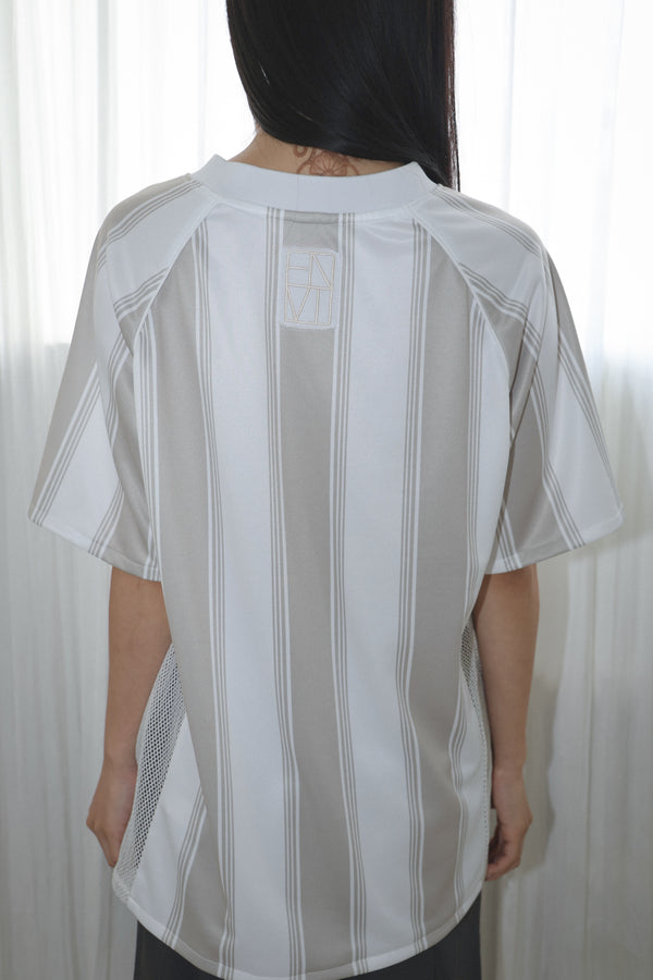 Enavant Track top in the color Silver Striped