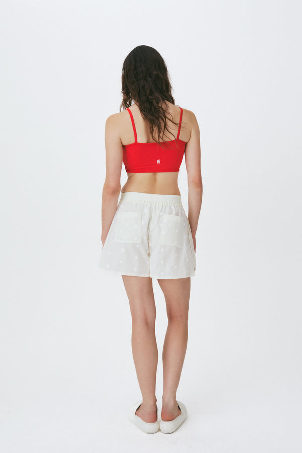 Enavant Lace trim track short in the color Cream