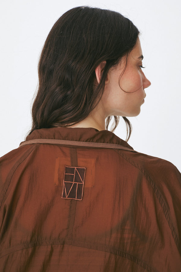 Enavant Sheer button-up windbreaker in the color Brown