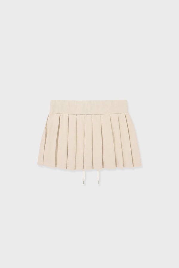 Enavant DYLAN PLEATED SKIRT in the color Coconut Beige