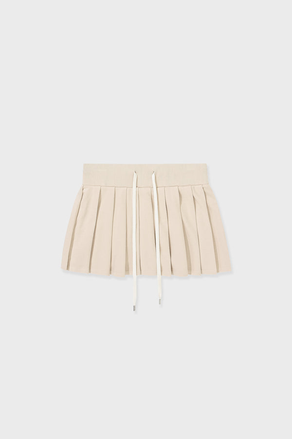 Enavant DYLAN PLEATED SKIRT in the color Coconut Beige